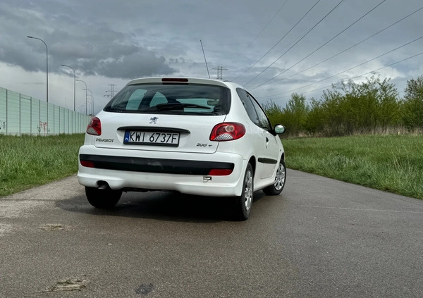 Peugeot 206 cena 10455 przebieg: 235000, rok produkcji 2011 z Wieliczka małe 92